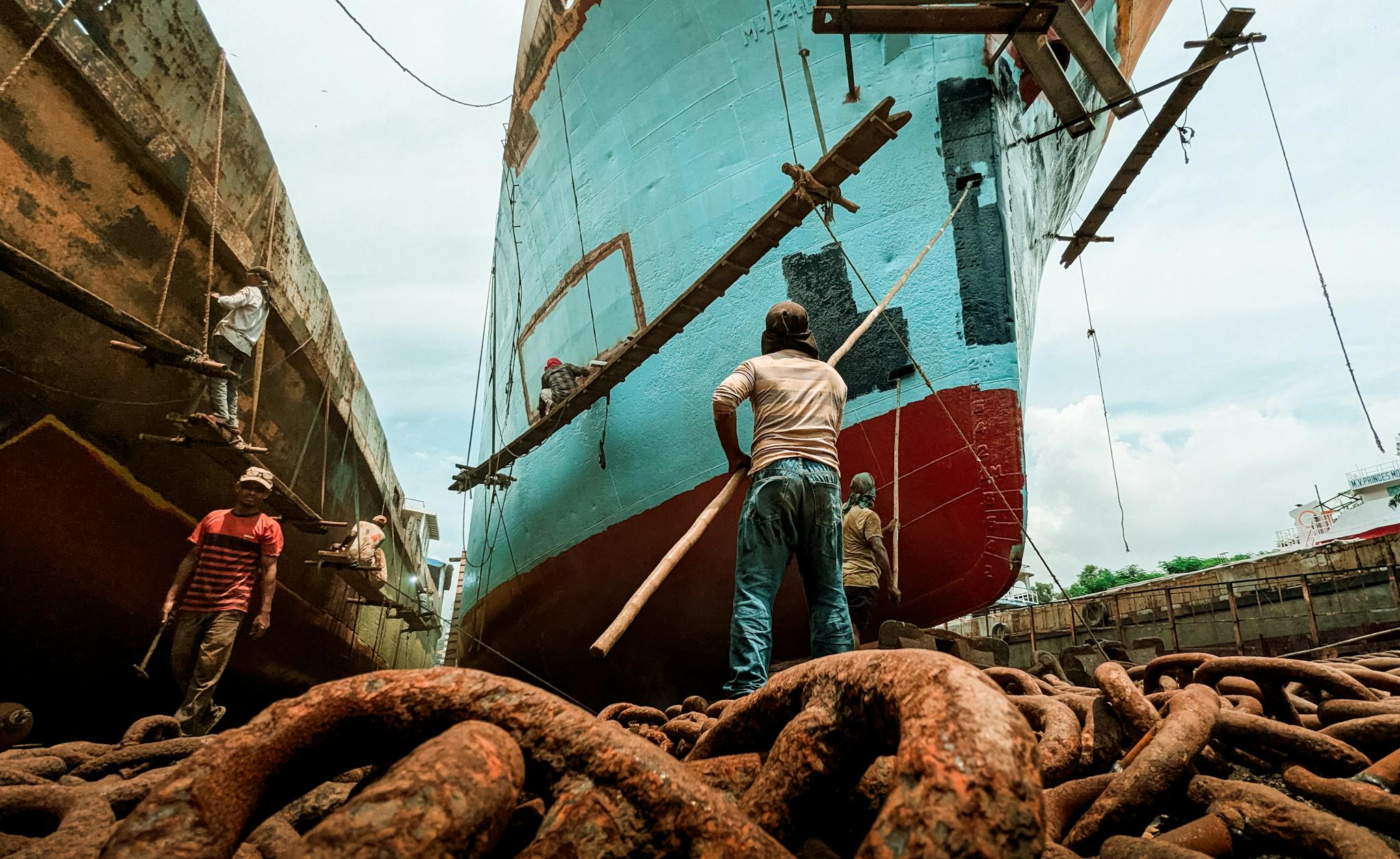Workers restoring a ship in Keraniganj dockyard, Dhaka, Bangladesh.